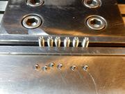Push screws with steel balls