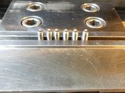 Push screws with steel balls glued in place